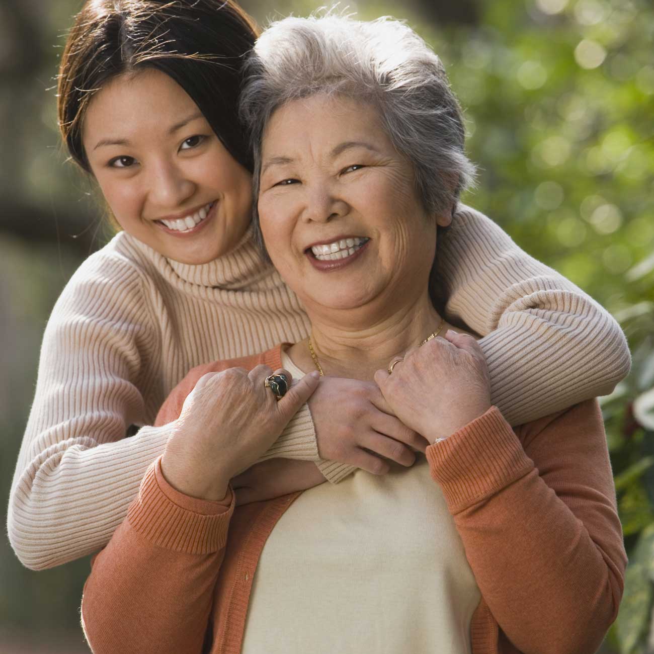 Daughter spending time with her senior mother at home
